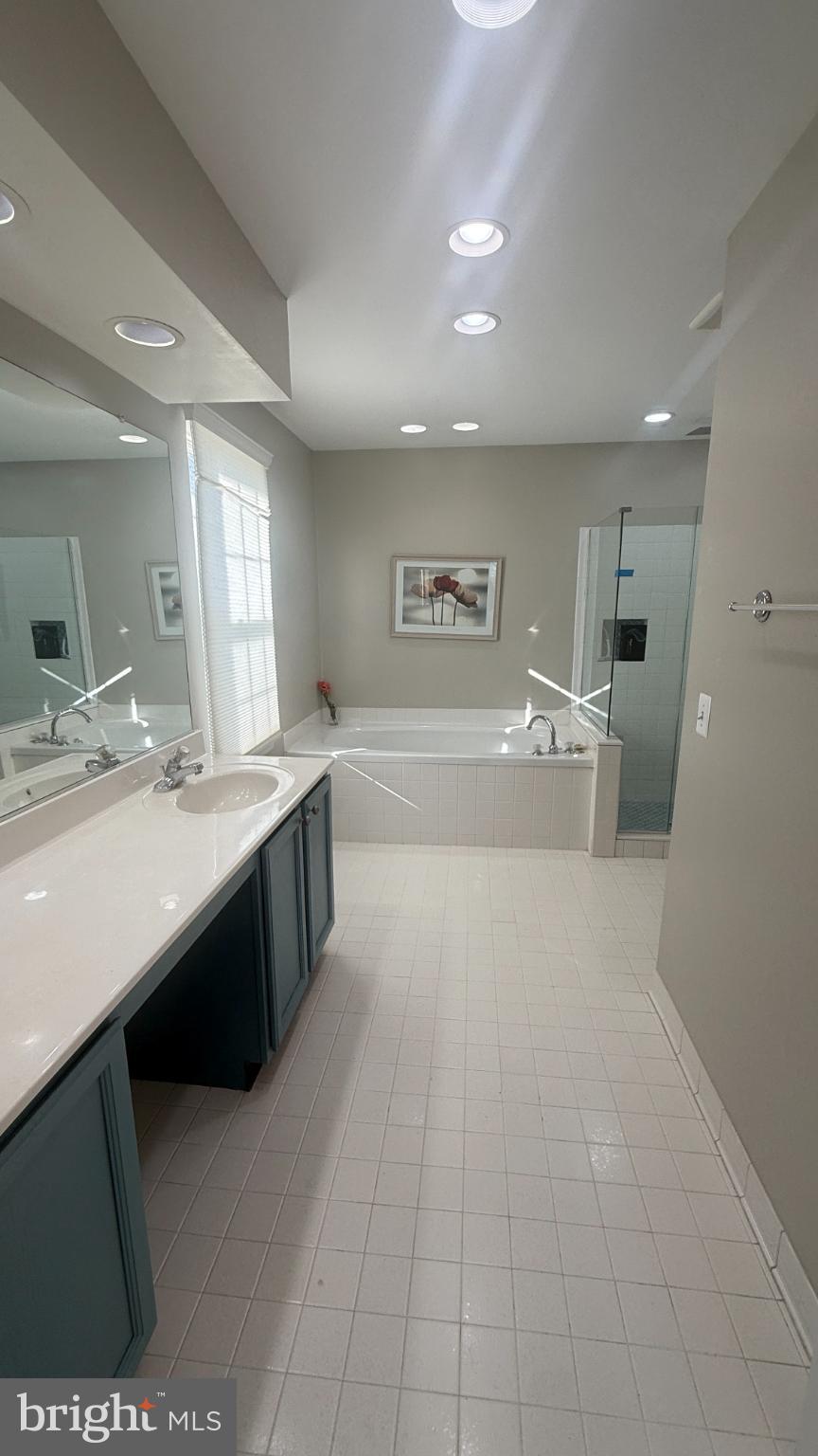 11 Hunters Forge Court Owings Mills, MD 21117 - Photo 77 of 139 Spacious, modern bathroom with elegant finishes.