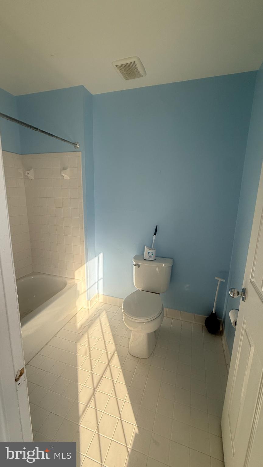 11 Hunters Forge Court Owings Mills, MD 21117 - Photo 94 of 139 Bright and airy bathroom with serene blue walls.