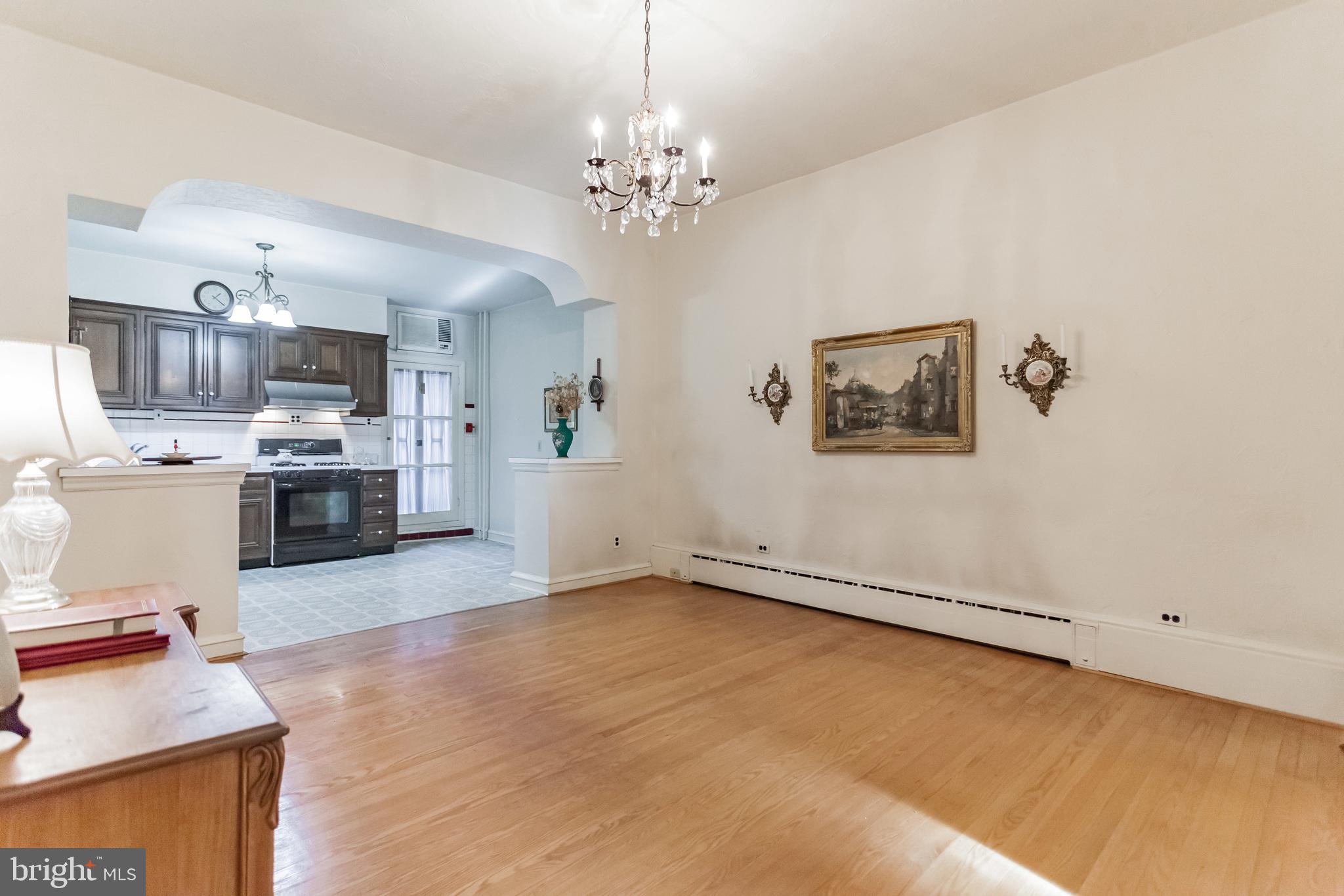 513 Pine Street Philadelphia, PA 19106 - Photo 3 of 32 a view of a kitchen with microwave and cabinets