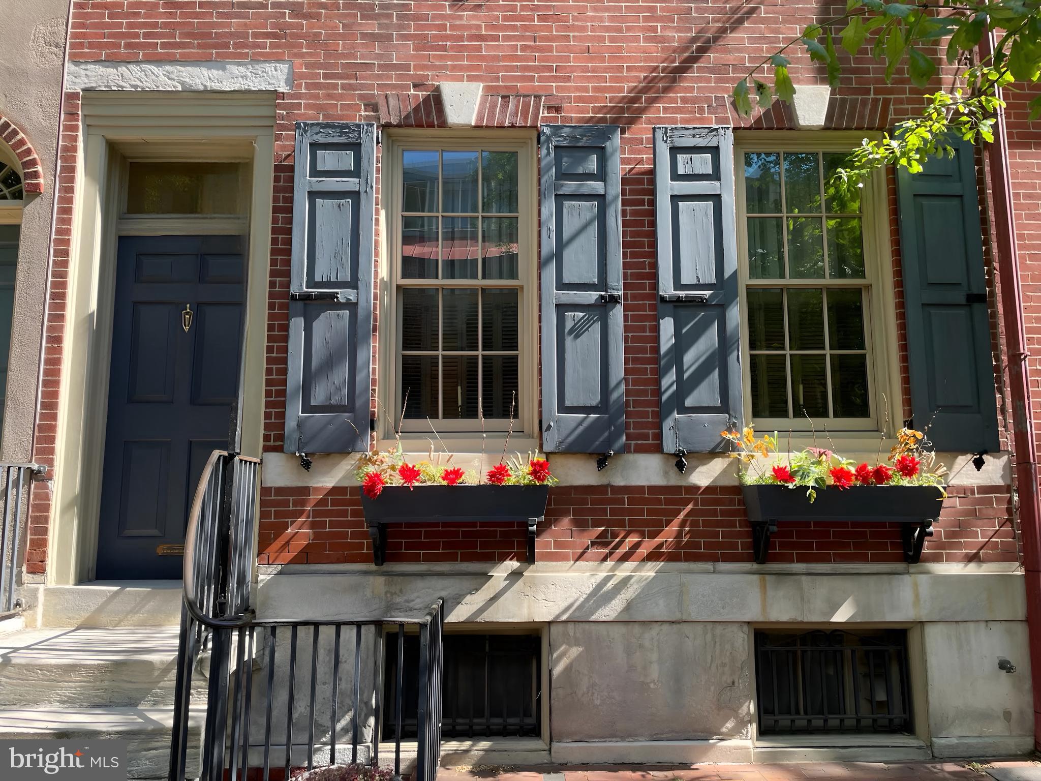 513 Pine Street Philadelphia, PA 19106 - Photo 32 of 32 a outdoor space of blue painted building with glass windows