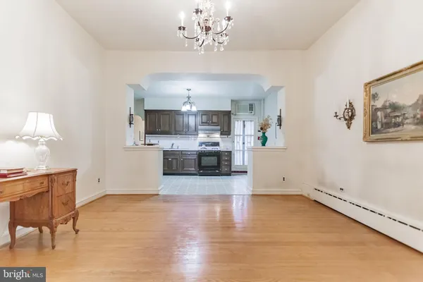 a view of a kitchen with microwave and cabinets