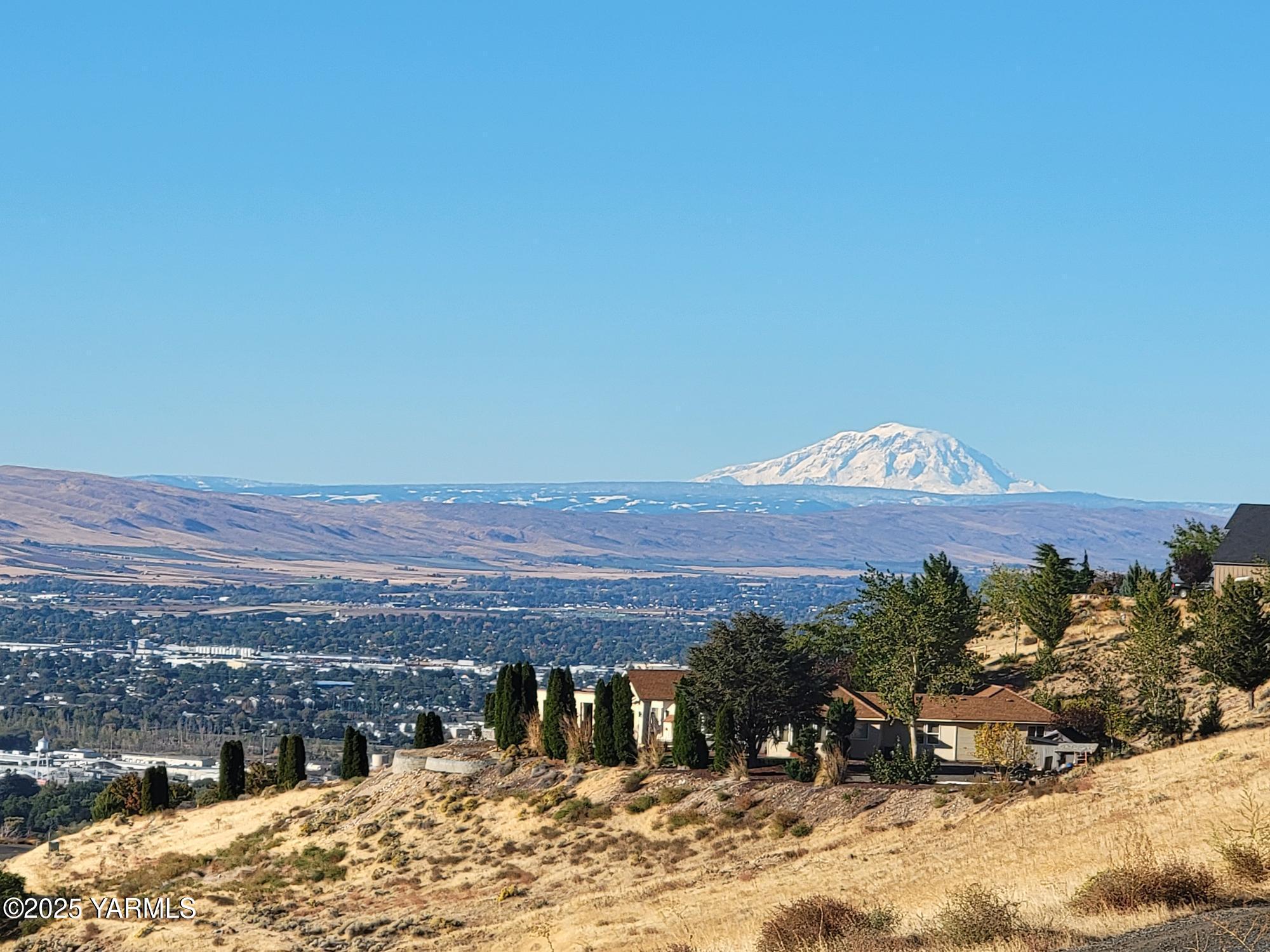 Nka Coyote Springs Road Yakima, WA 98901 - Photo 1 of 4 a view of a outdoor space with a mountain in the background