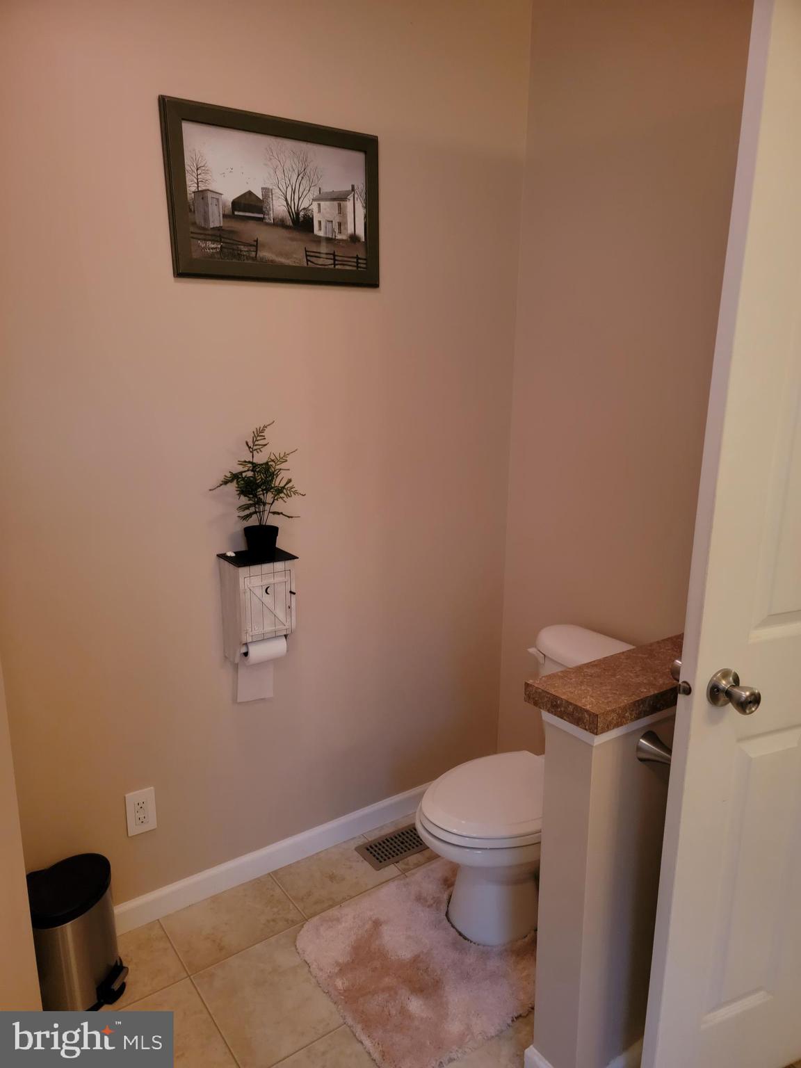 2800 High Point Road Cochranville, PA 19330 - Photo 8 of 24 a white toilet sitting next to a white wall