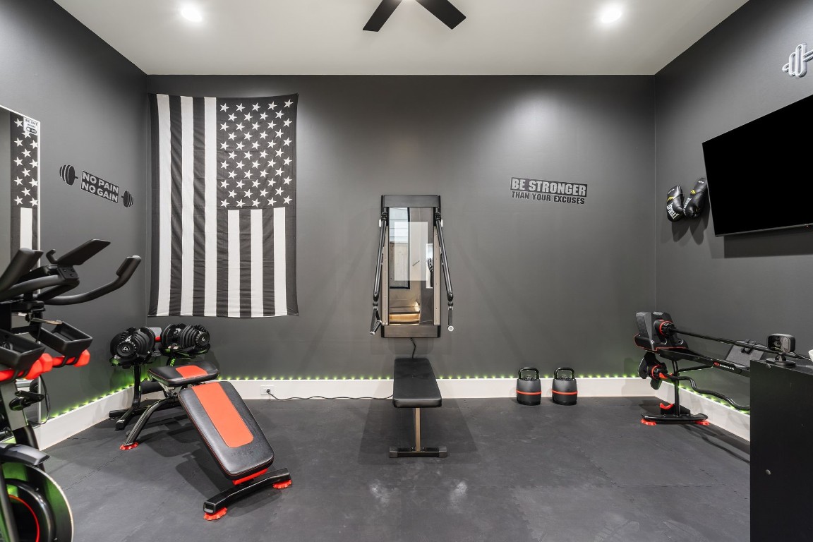 1918 Brun Street Houston, TX 77019 - Photo 5 of 43 The space features modern recessed lighting, a sleek contemporary color palette, and ample wall space, making it ideal for a study, fitness area, or additional flex space.