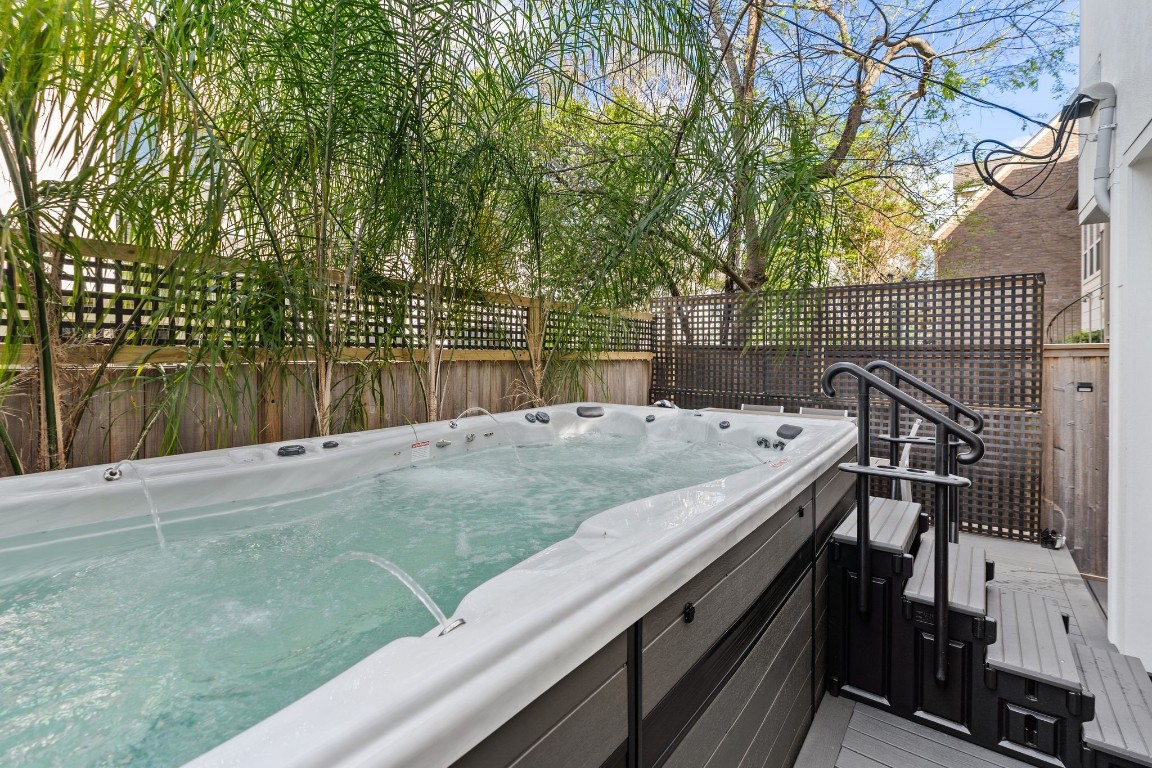 1918 Brun Street Houston, TX 77019 - Photo 8 of 43 Relax and recharge in your own private hot tub that is positioned within the outdoor living space.