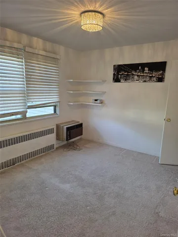 a view of a livingroom with an empty space