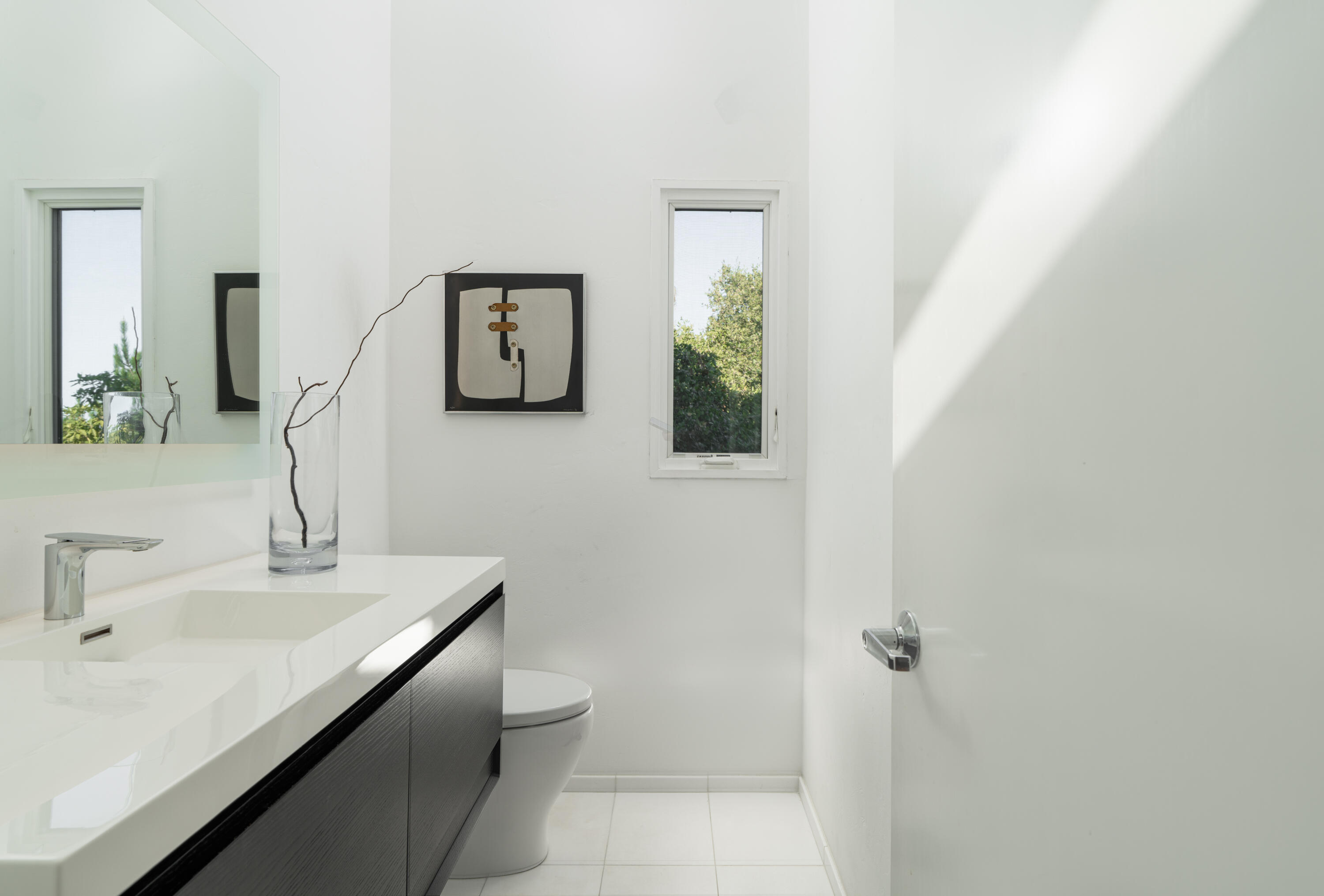 1315 Mission Ridge Road Santa Barbara, CA 93103 - Photo 14 of 34 a bathroom with a sink and a mirror