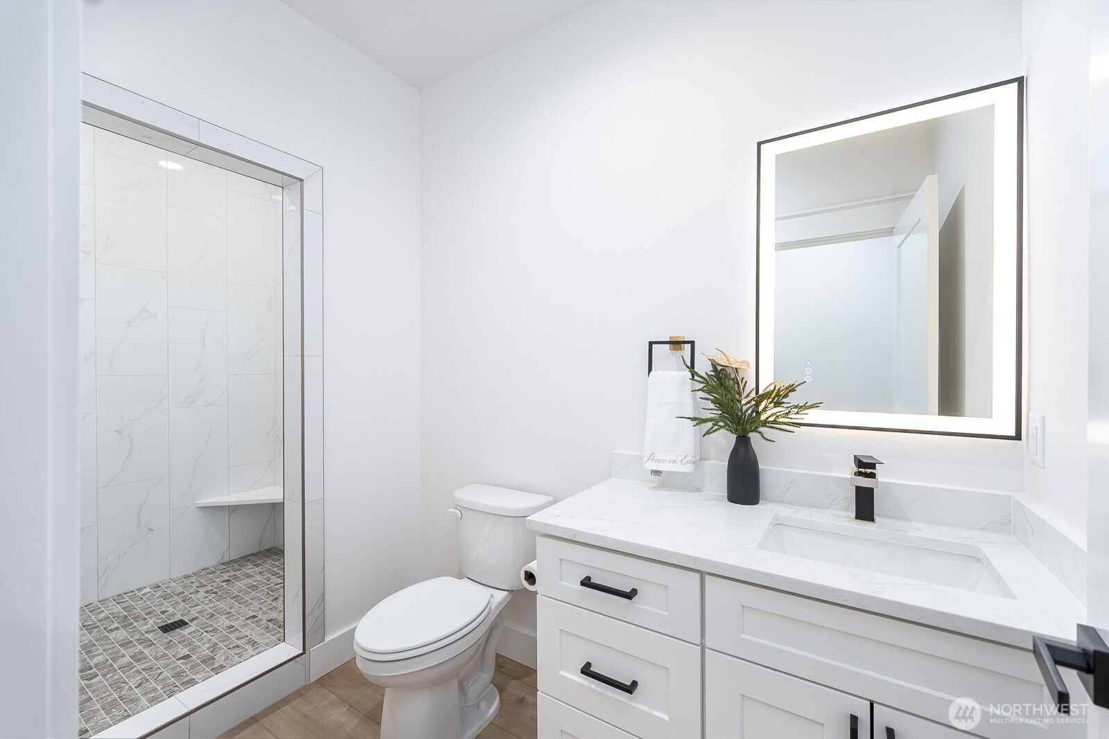 2394 Hunters Street Ephrata, WA 98823 - Photo 23 of 29 a bathroom with a sink a toilet and a mirror