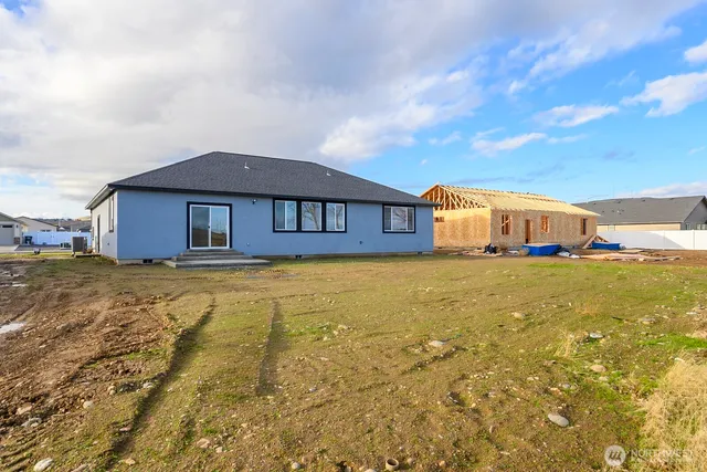 a front view of a house with swimming pool