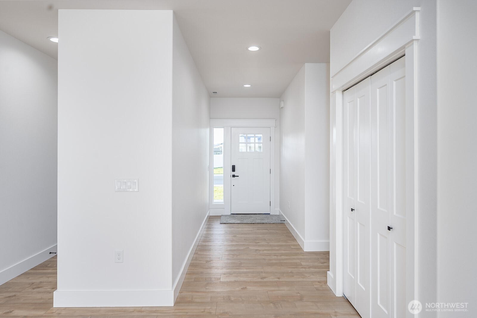2394 Hunters Street Ephrata, WA 98823 - Photo 7 of 29 a view of a hallway with wooden floor