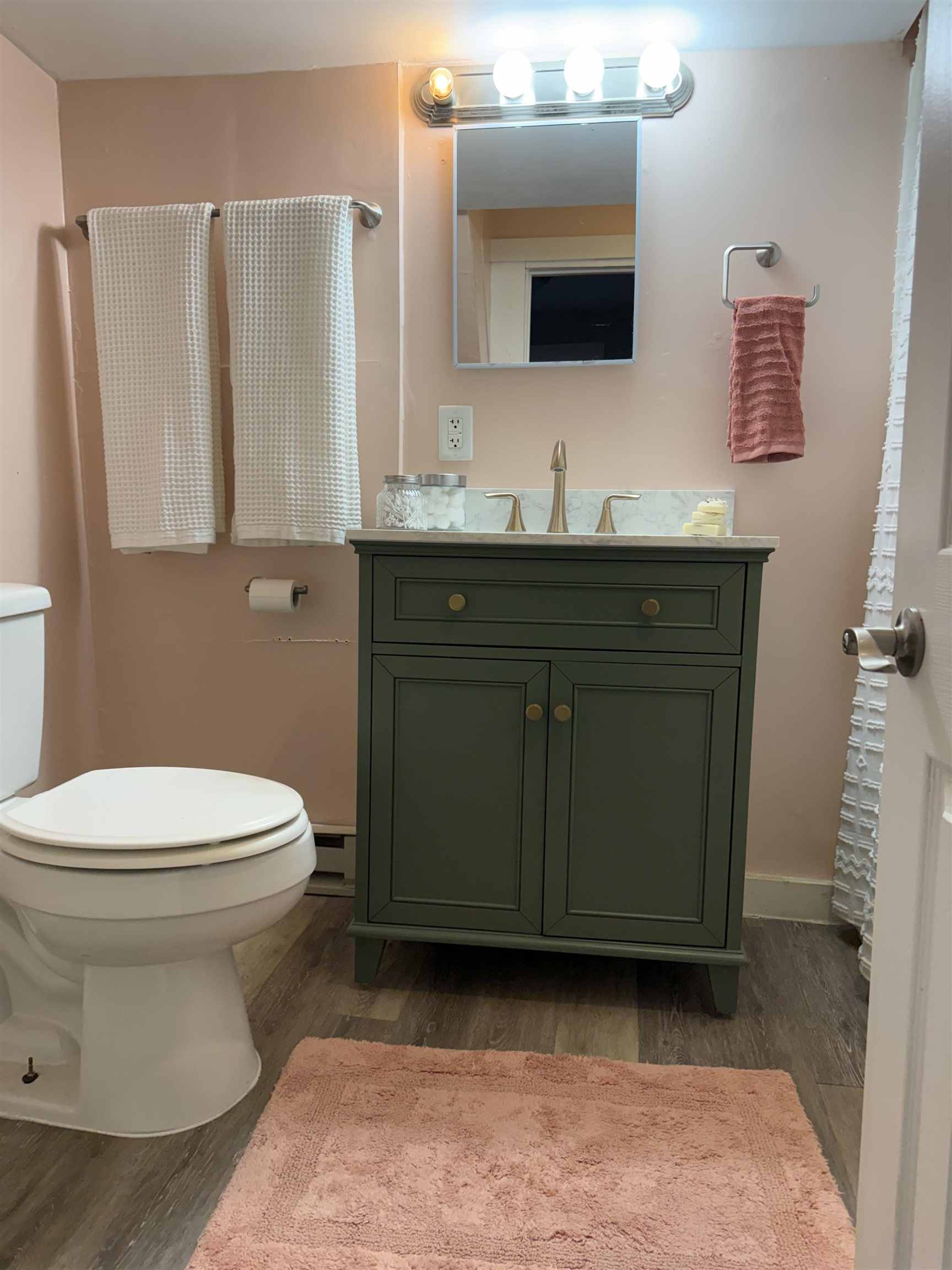 635-633 Stuart Street Staunton, VA 24401 - Photo 23 of 41 a bathroom with a toilet sink and mirror