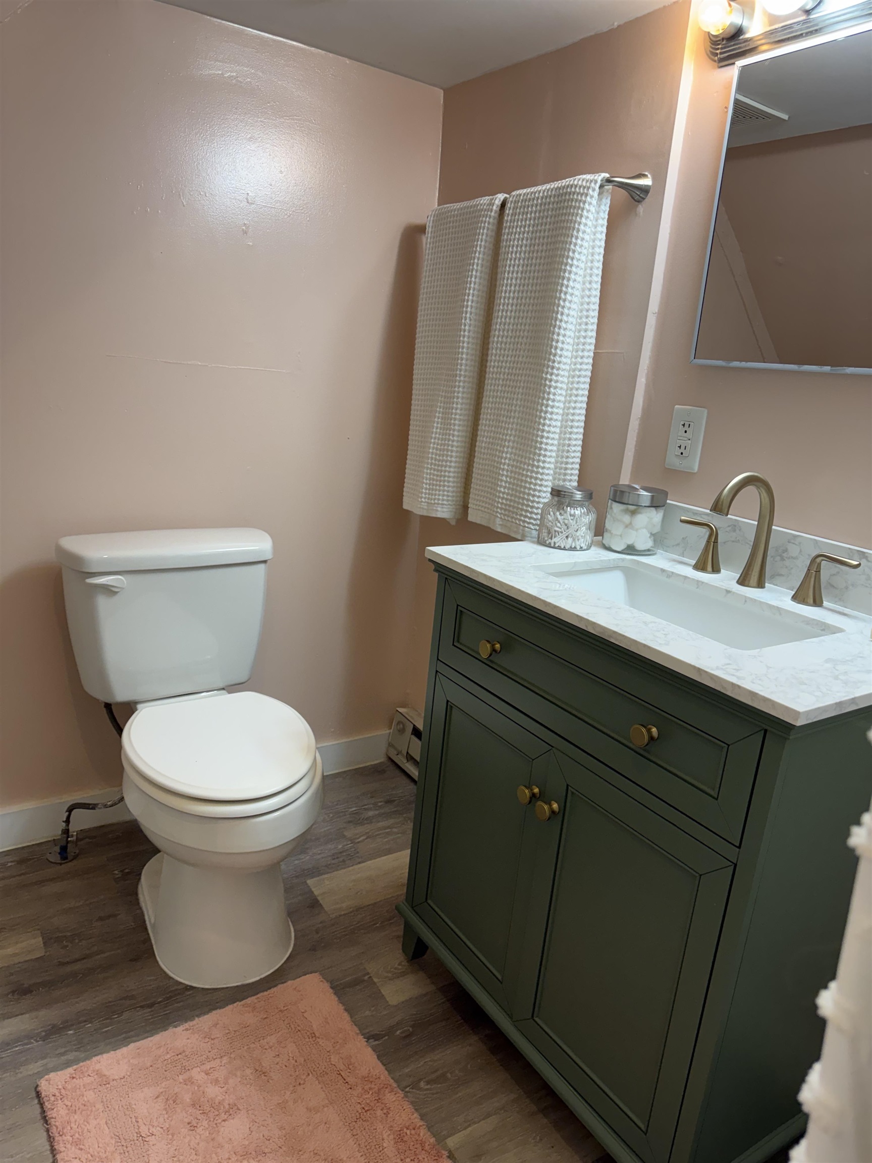 635-633 Stuart Street Staunton, VA 24401 - Photo 25 of 41 a bathroom with a toilet sink and mirror