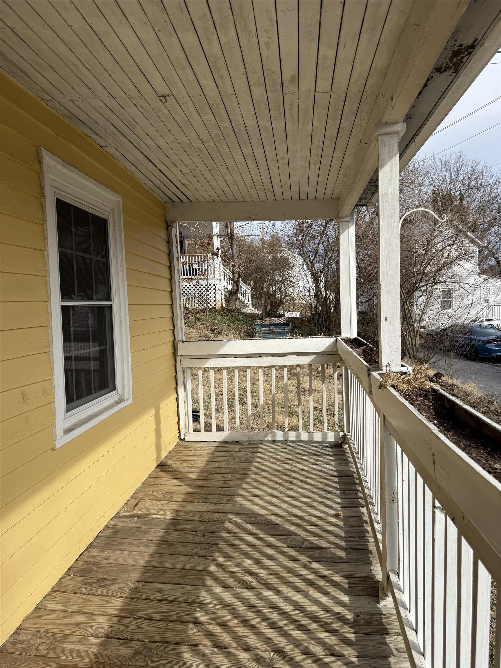 635-633 Stuart Street Staunton, VA 24401 - Photo 40 of 41 a view of a porch with wooden floor and outdoor space