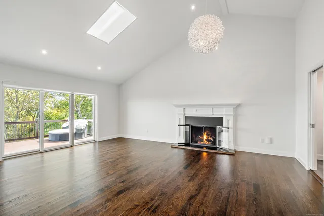 a bathroom with a bathtub and toilet