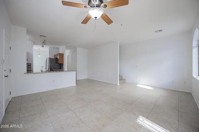 a view of an empty room and window