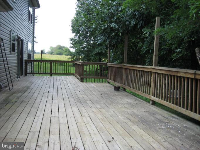 563 Leeds Road Elkton, MD 21921 - Photo 4 of 23 Large back deck accessed through kitchen sliders.