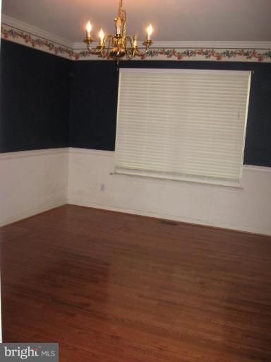 563 Leeds Road Elkton, MD 21921 - Photo 7 of 23 Formal dining room w hardwood floors & chair rail