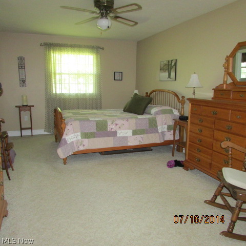 730 Trump Road Northeast Atwater, OH 44201 - Photo 13 of 16 The master bedroom is large. There are a total of 3 bedrooms all on the first floor.