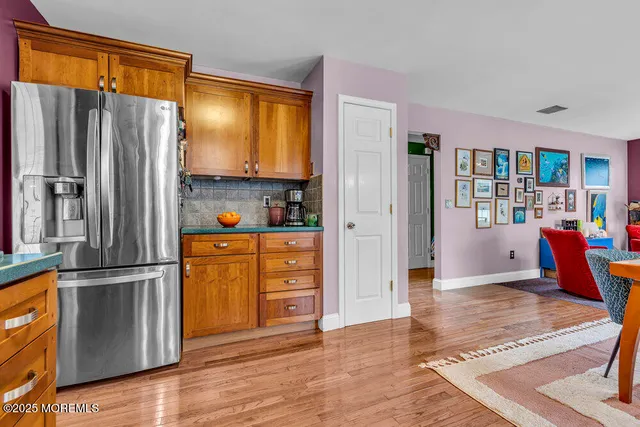 a view of a house with wooden deck