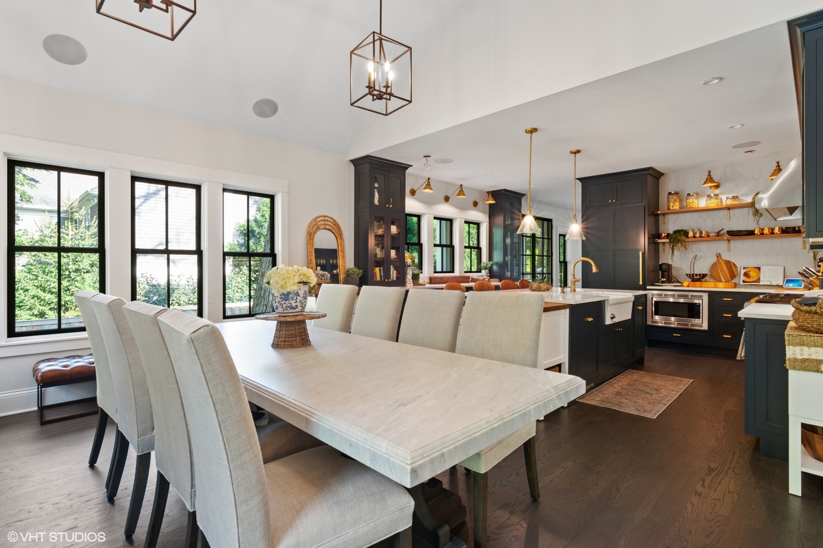 735 Baldwin Road Highland Park, IL 60035 - Photo 7 of 30 a living room with furniture dining table and a large window