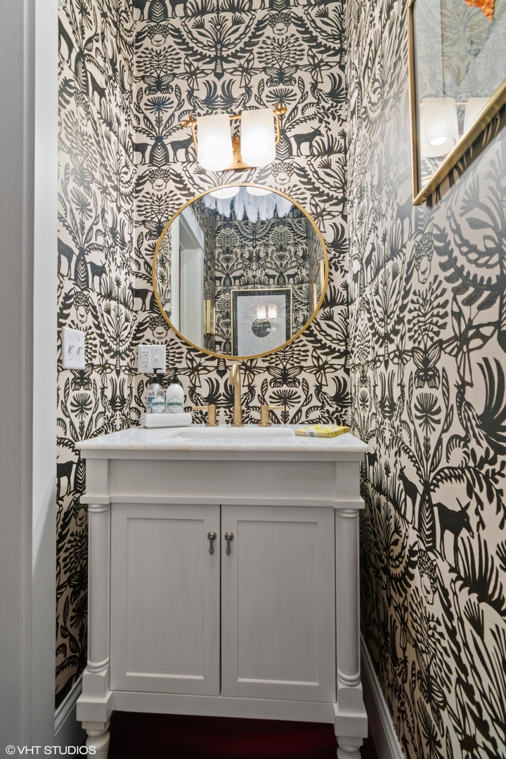 735 Baldwin Road Highland Park, IL 60035 - Photo 9 of 30 a bathroom with a sink and mirror