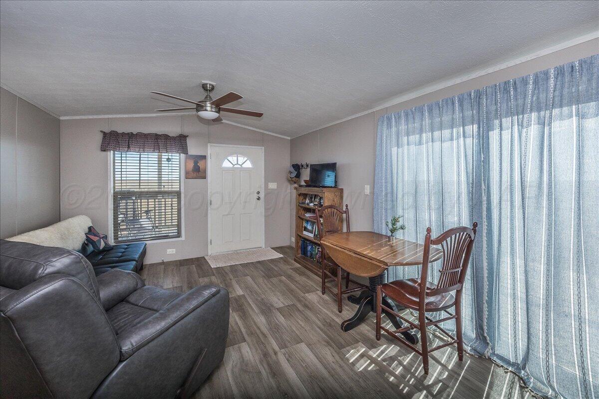 39600 Farm To Market 1705 Happy, TX 79042 - Photo 4 of 10 a living room with furniture and wooden floor