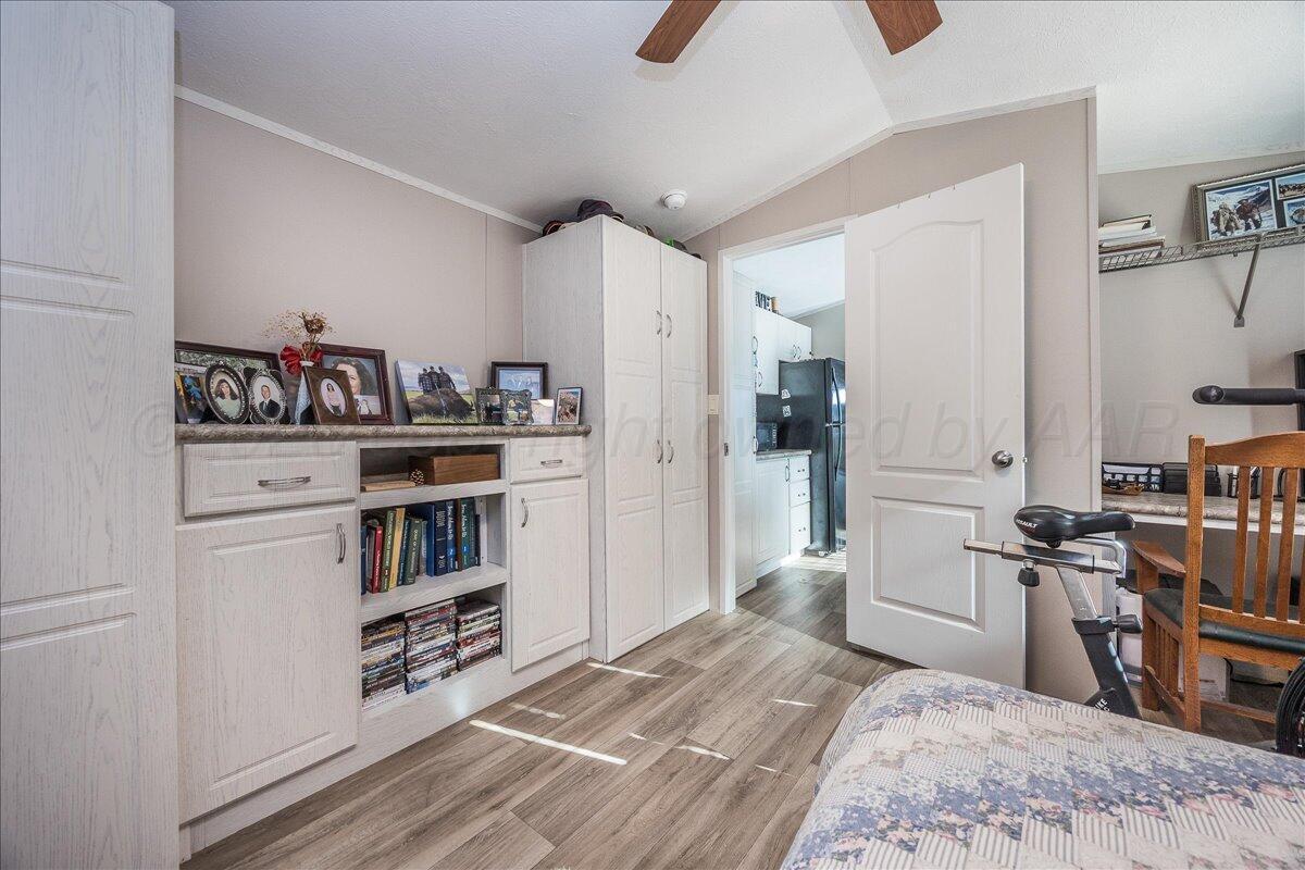 39600 Farm To Market 1705 Happy, TX 79042 - Photo 9 of 10 a kitchen with stainless steel appliances a stove a refrigerator and cabinets