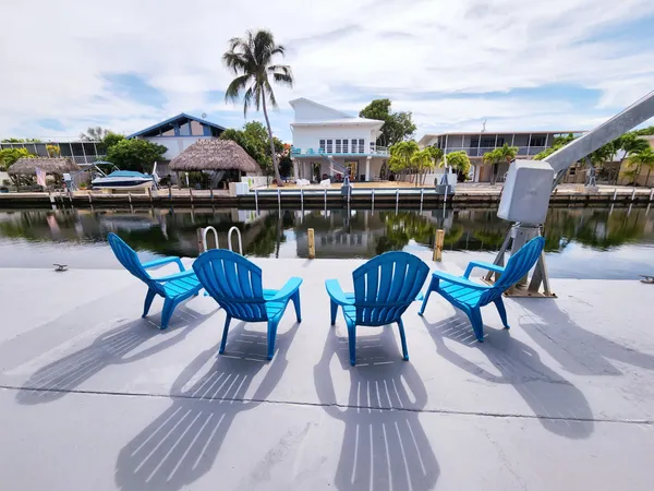 a view of a chairs and table on the terrace