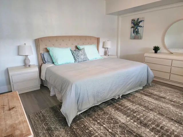 a balcony view with a seating space