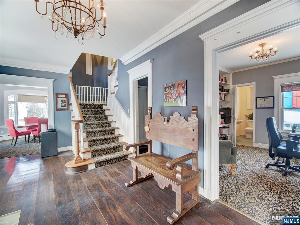 5 Park Road Paterson, NJ 07514 - Photo 12 of 30 a view of hall way with furniture and wooden floor