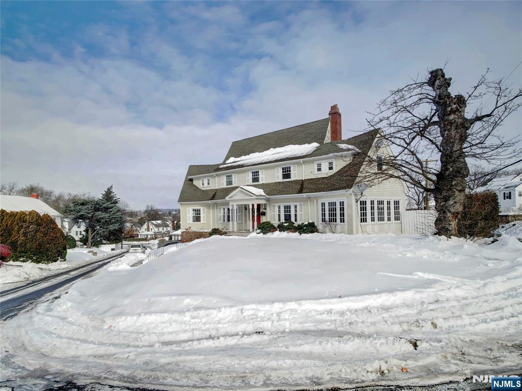 5 Park Road Paterson, NJ 07514 - Photo 2 of 30 a front view of a house with a yard