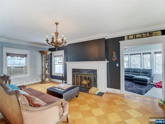 a workspace with furniture and book shelf