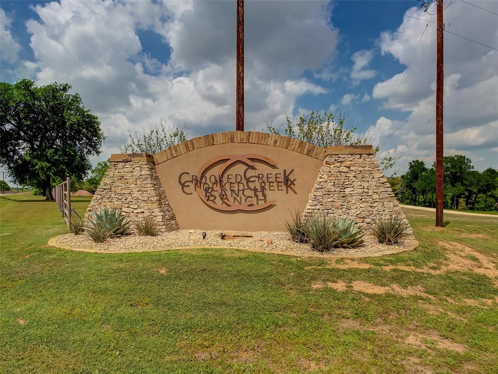 a view of a water fountain with a big yard