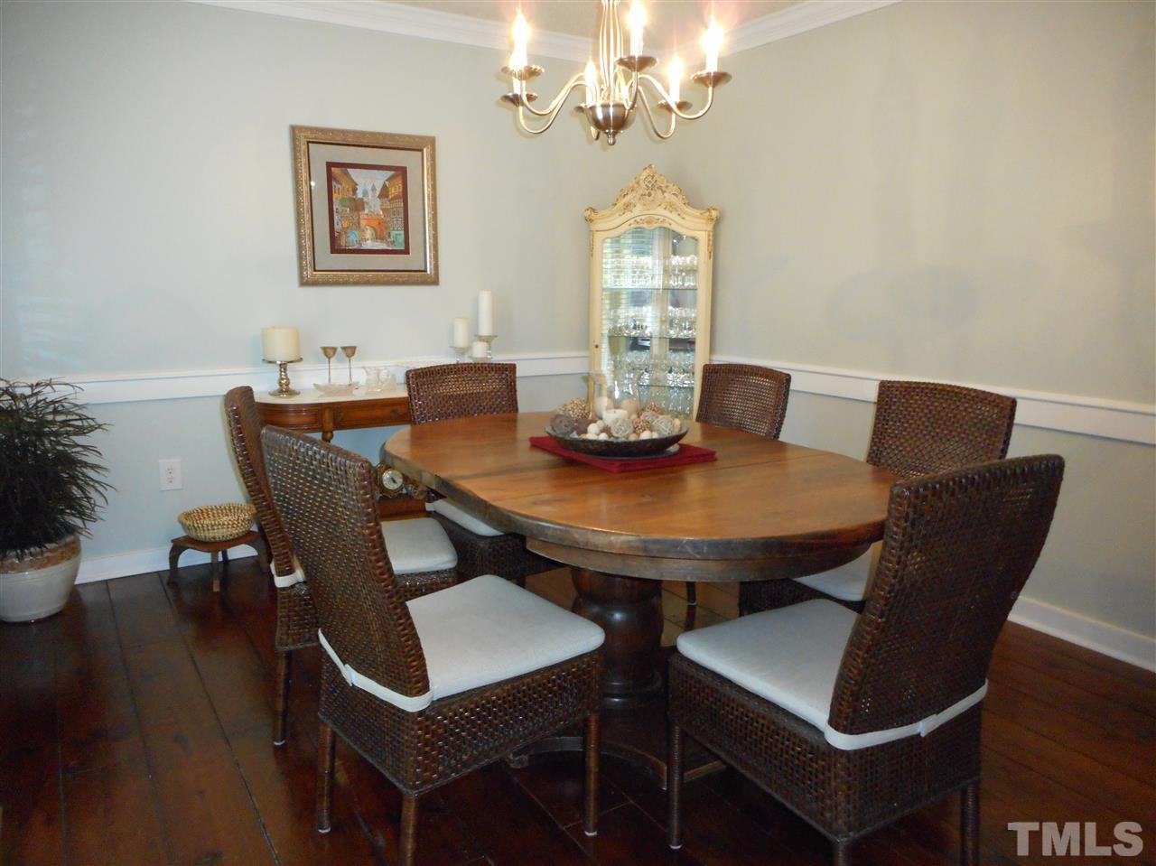2616 Howard Road Raleigh, NC 27613 - Photo 4 of 16 a view of a dining room with furniture and wooden floor
