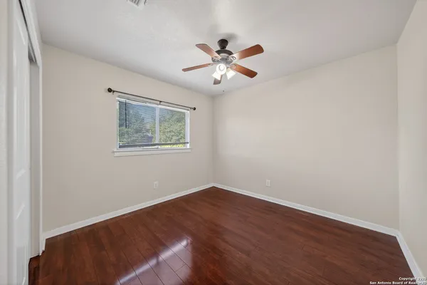 a bathroom with a double vanity sink toilet and shower