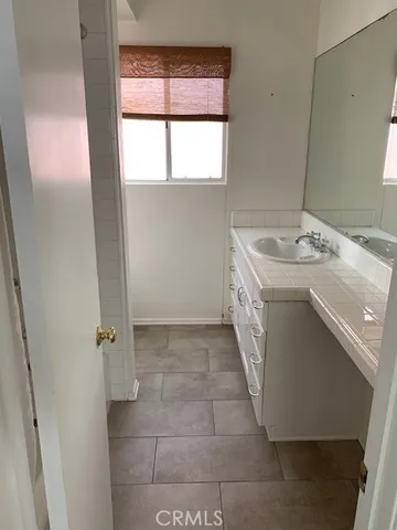 a utility room with a sink a washer and dryer