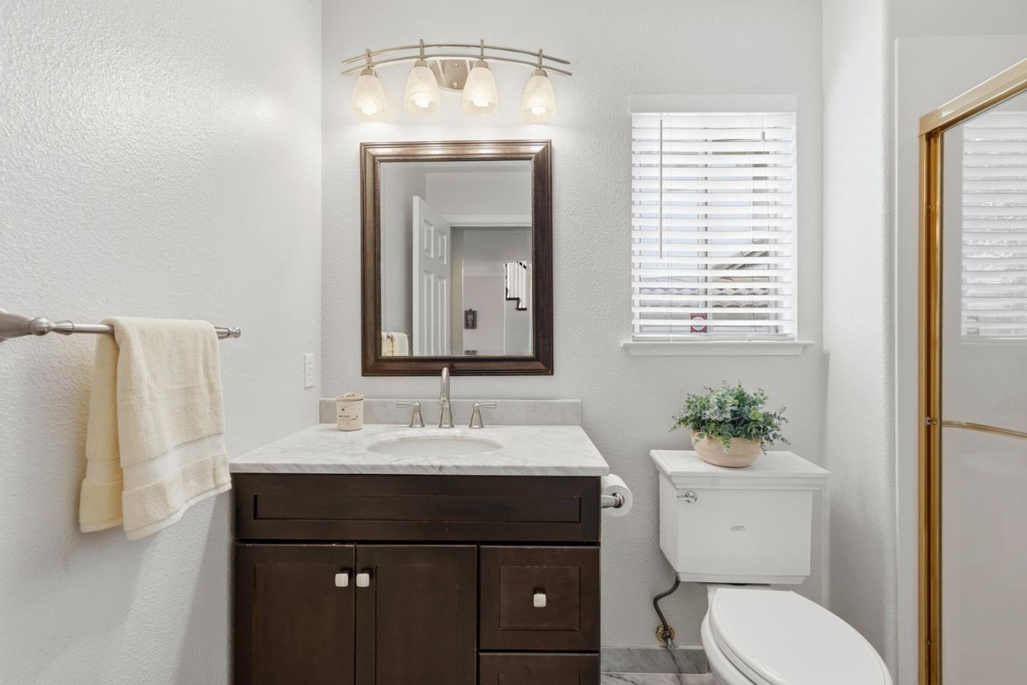 35 Sierra Ridge Court Danville, CA 94506 - Photo 14 of 37 a bathroom with a sink vanity granite and toilet