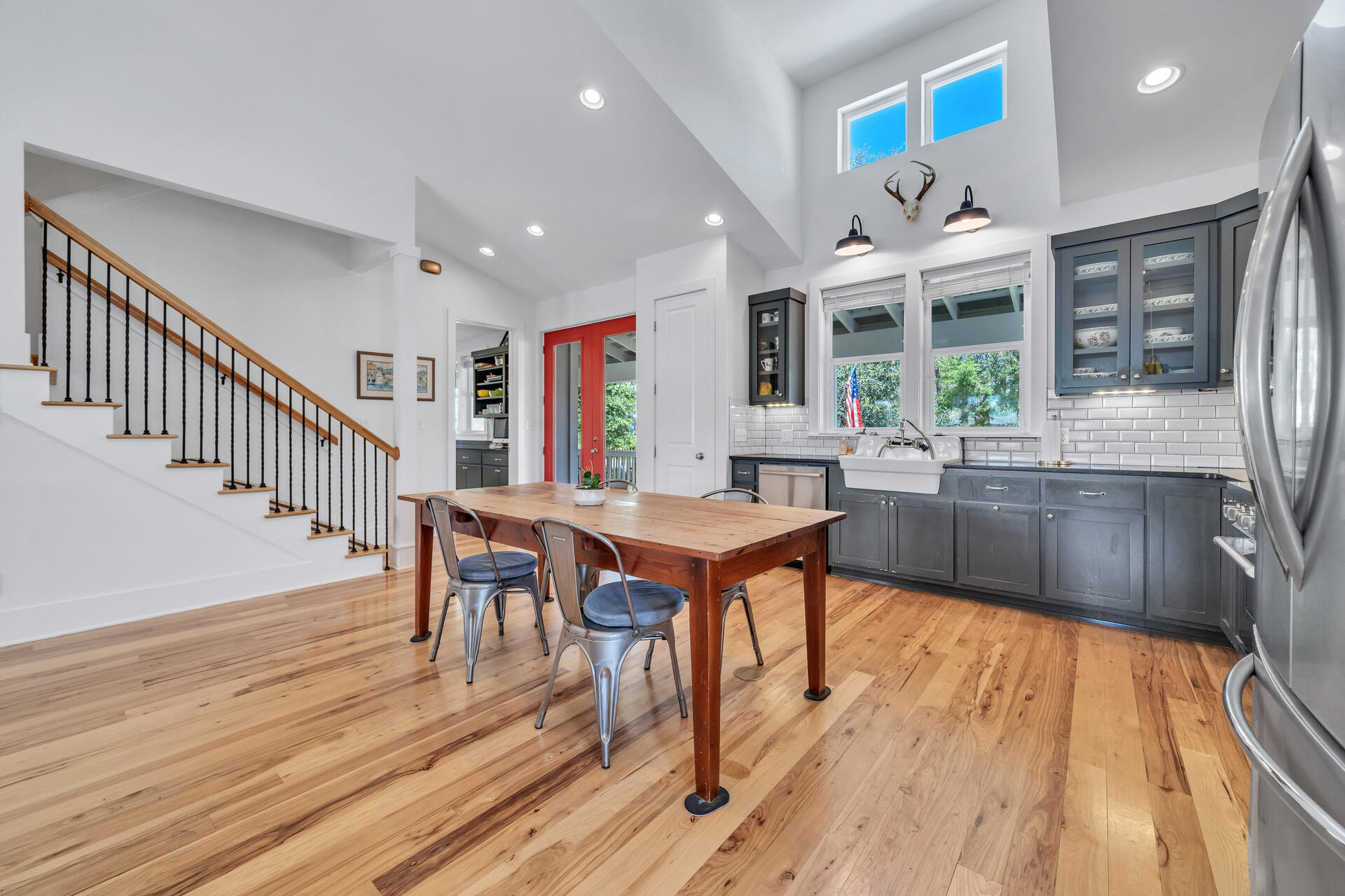 192 Buck Road Santa Rosa Beach, FL 32459 - Photo 17 of 74 a dining hall with stainless steel appliances granite countertop a stove and a wooden floors