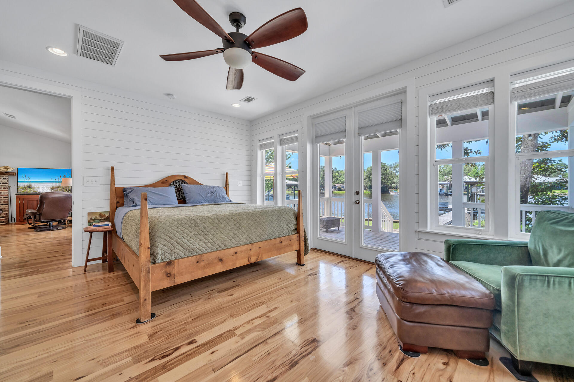192 Buck Road Santa Rosa Beach, FL 32459 - Photo 22 of 74 a bedroom with a bed window and couch