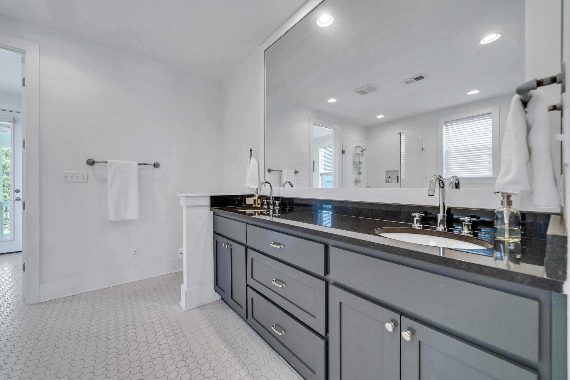 192 Buck Road Santa Rosa Beach, FL 32459 - Photo 24 of 74 a kitchen with a sink and cabinets