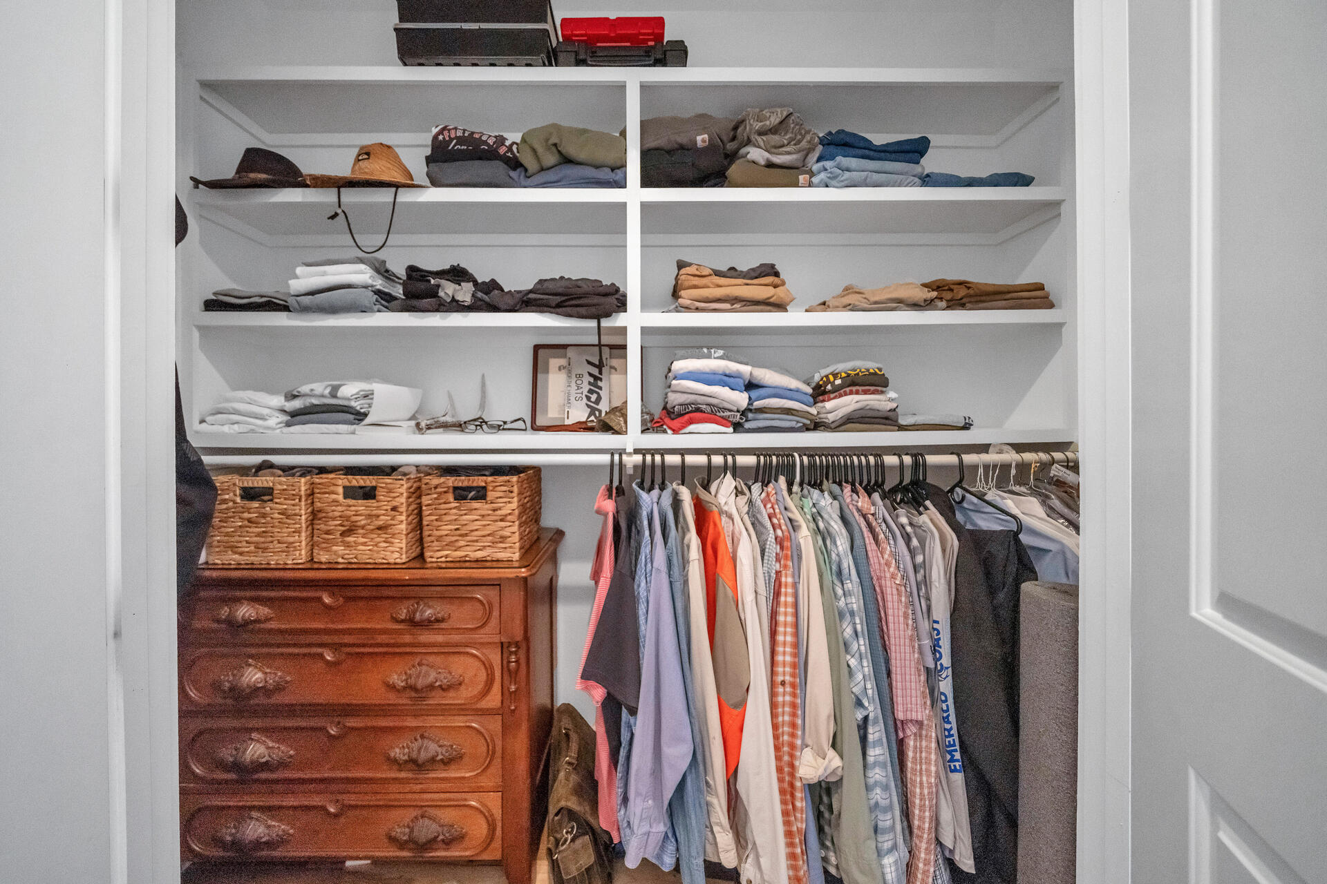 192 Buck Road Santa Rosa Beach, FL 32459 - Photo 42 of 74 a view of walk in closet with clothes and shoes