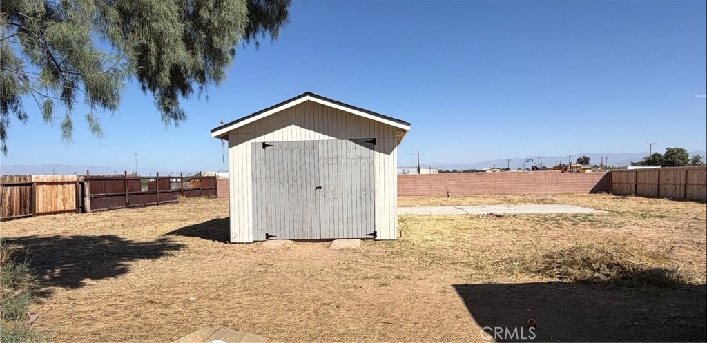 716 West Church Avenue Ridgecrest, CA 93555 - Photo 12 of 13 a view of a backyard of the house