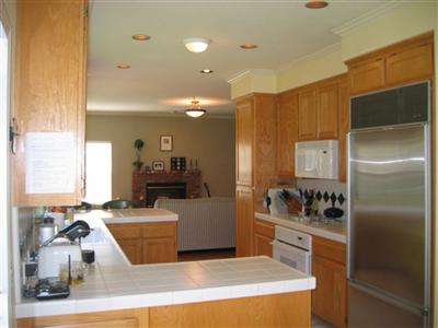 3360 Andy Way Santa Rosa, CA 95404 - Photo 6 of 12 Kitchen with stainless steel appliances and Subzero refrigerator opens up to family room