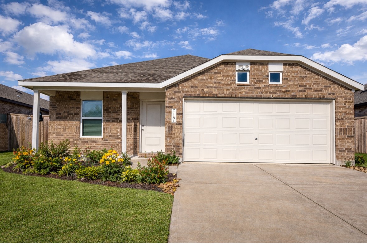 Beautifully maintained single-story home with attractive brick exterior, covered front porch, and inviting curb appeal. A wide driveway and two-car garage provide convenience, while the landscaped front yard adds warmth and charm