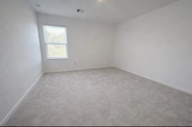 an empty room with a window