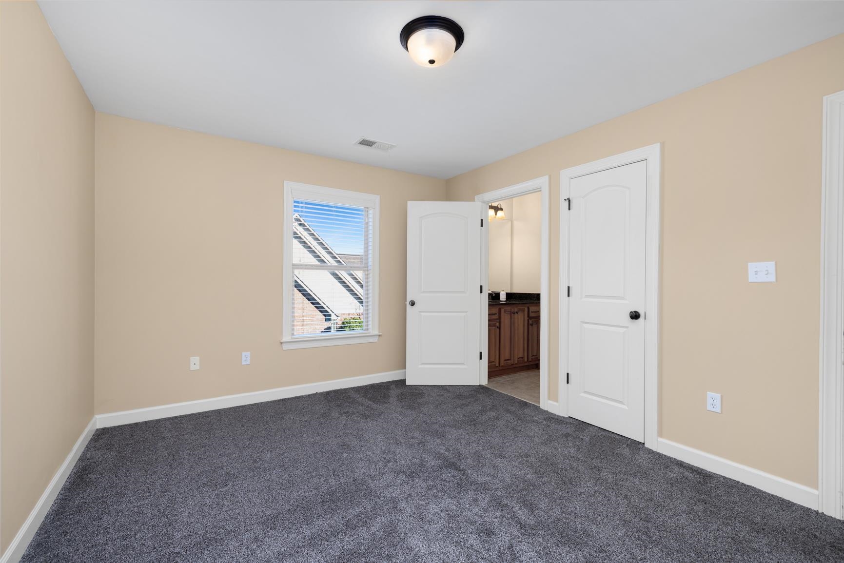 104 Eagle Trace Road Covington, TN 38019 - Photo 24 of 40 Unfurnished bedroom with carpet and ensuite bath