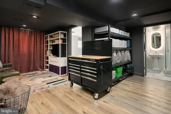 a bed room with a bed and a television