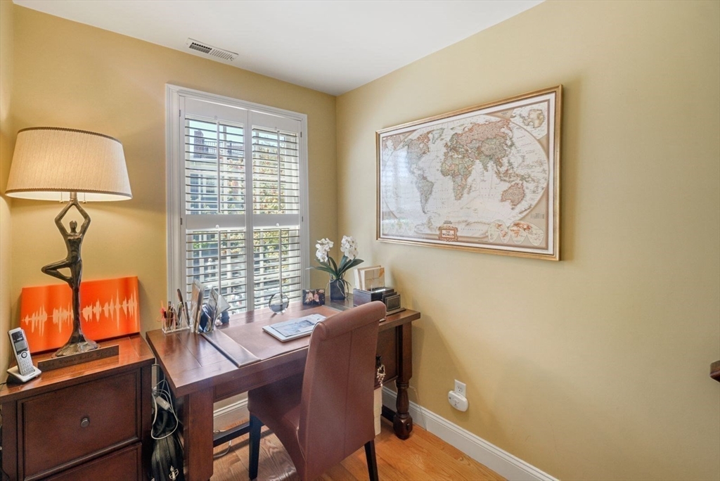 65 Rutherford Avenue Boston, MA 02129 - Photo 11 of 25 a view of a workspace with furniture and a window