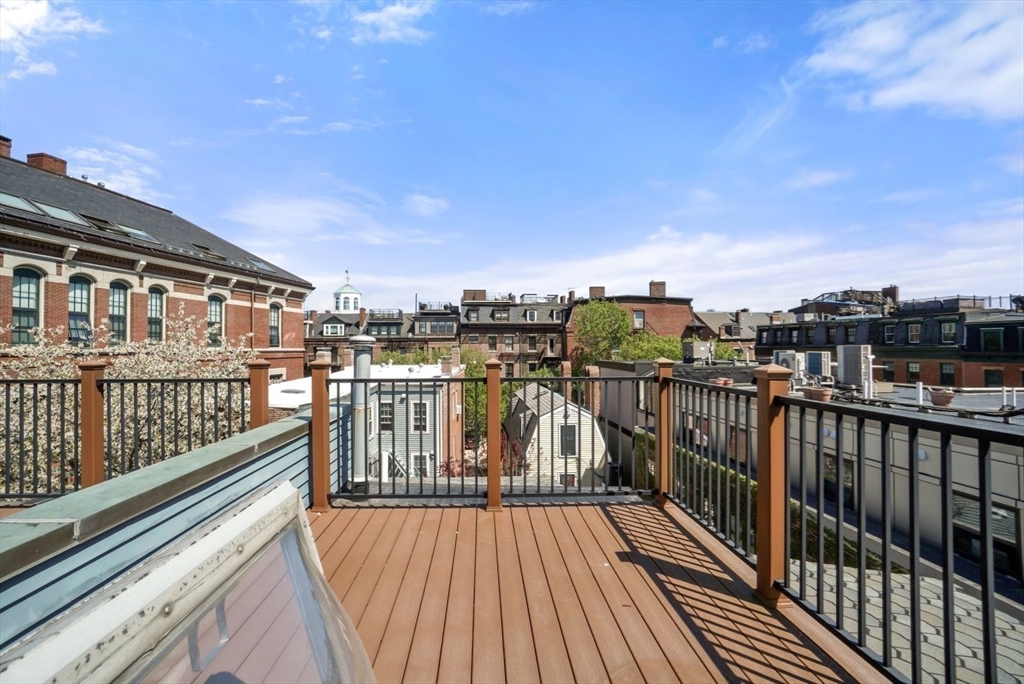 65 Rutherford Avenue Boston, MA 02129 - Photo 16 of 25 a view of balcony with wooden floor