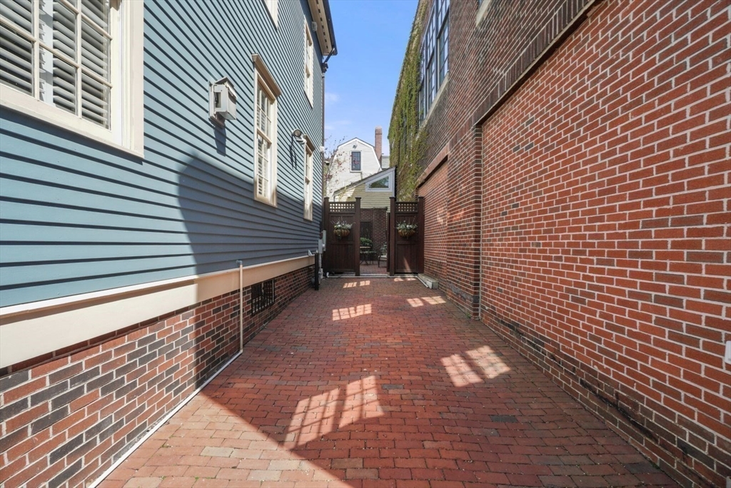 65 Rutherford Avenue Boston, MA 02129 - Photo 19 of 25 a view of a pathway with a house